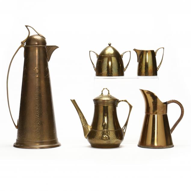 five-signed-art-nouveau-brass-serving-accessories