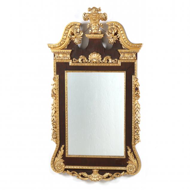 a-large-george-ii-style-carved-and-parcel-gilt-looking-glass