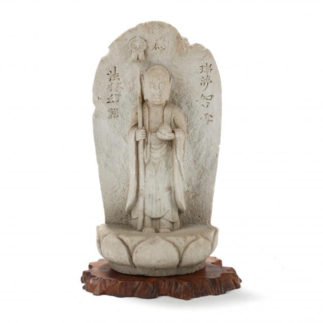 a-japanese-carved-stone-sculpture-of-jizo-bosatsu