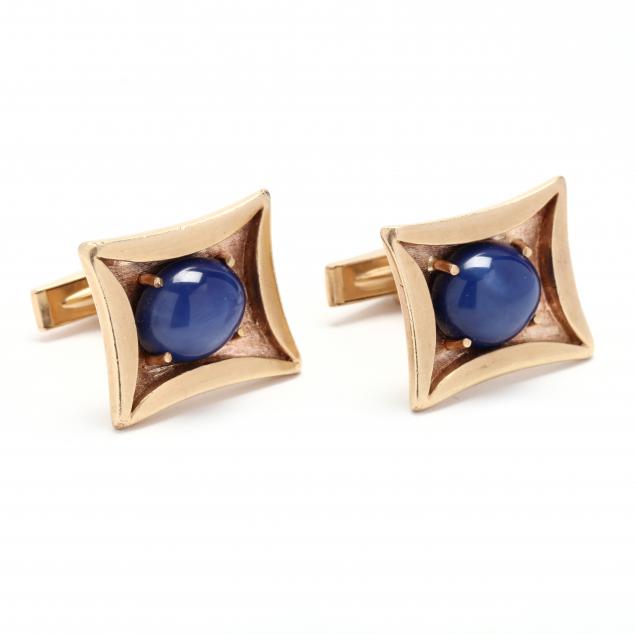pair-of-gold-and-synthetic-star-sapphire-cufflinks