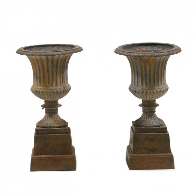pair-of-medium-sized-classical-style-cast-iron-urns-on-pedestals