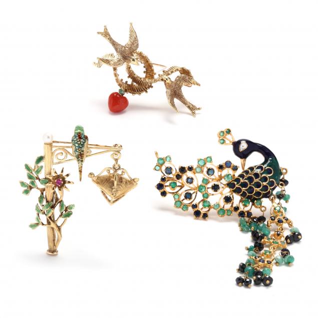 three-gold-and-gem-set-avian-motif-brooches