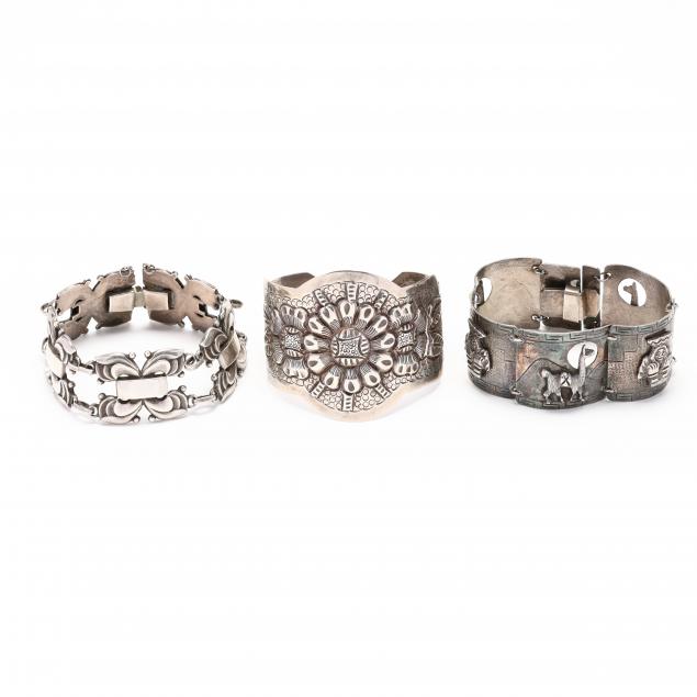 three-silver-bracelets