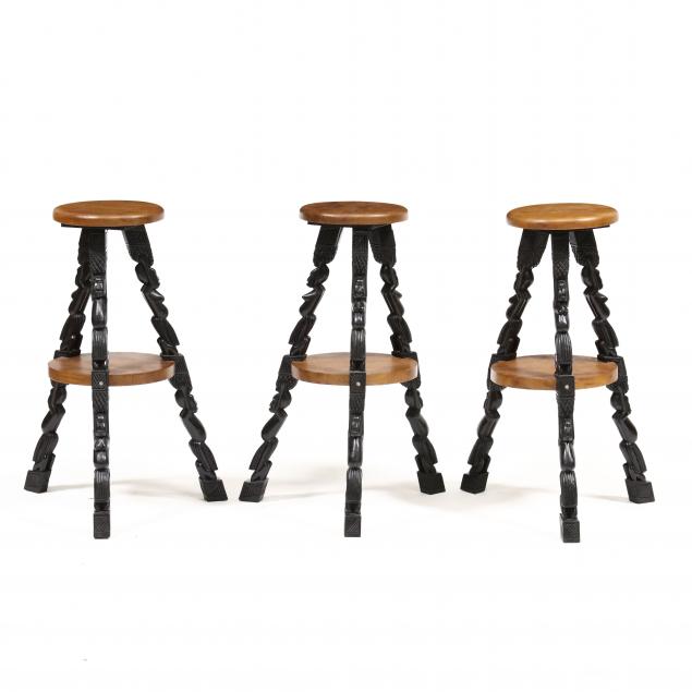 three-african-themed-carved-wood-stools