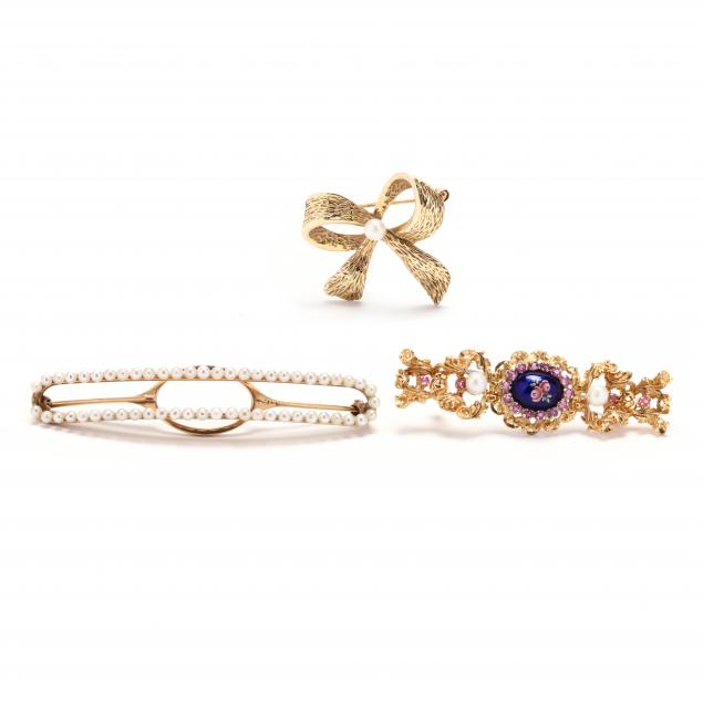 three-gold-and-gem-set-brooches