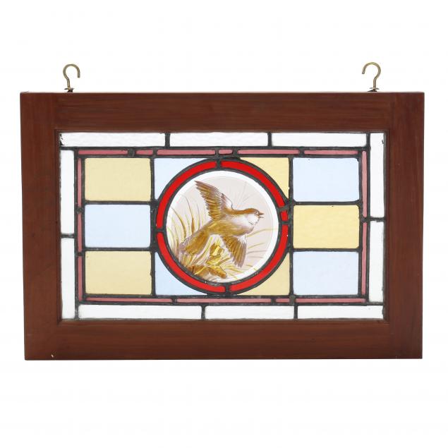 small-vintage-stained-glass-window-of-a-bird