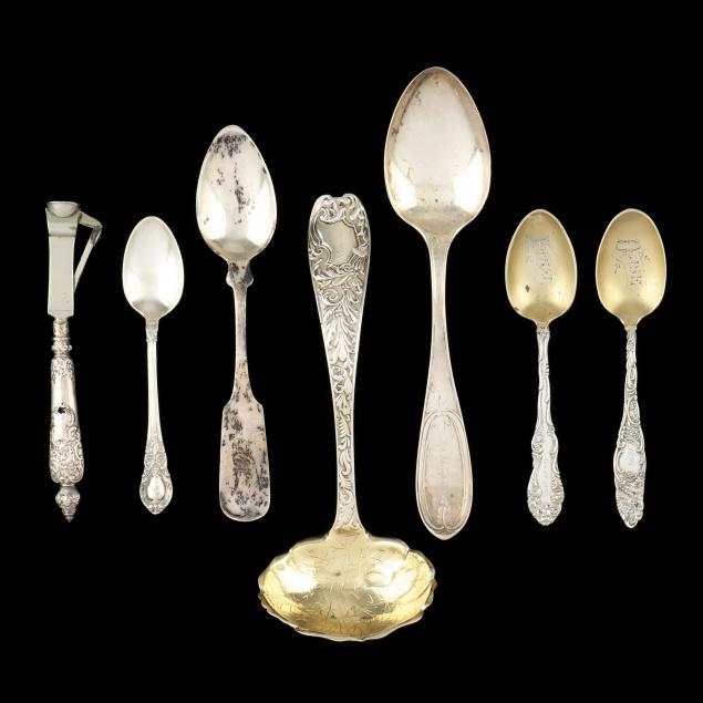 collection-of-seven-assorted-silver-flatware-pieces