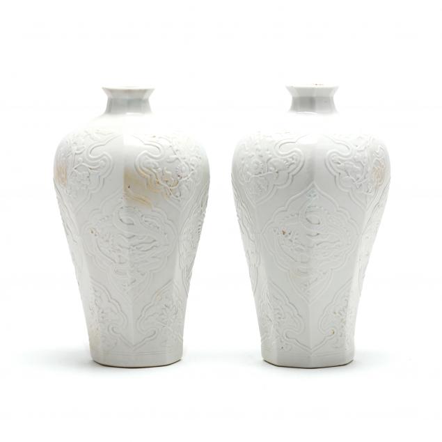 a-pair-of-chinese-white-glazed-relief-carved-vases