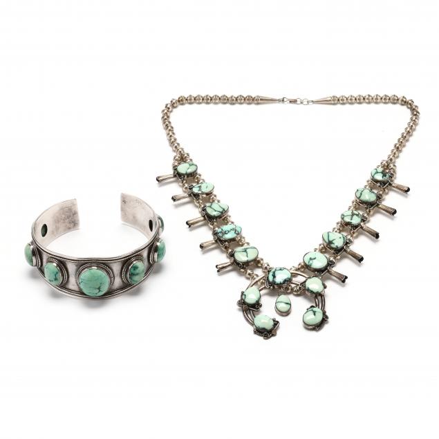 two-silver-and-turquoise-jewelry-items