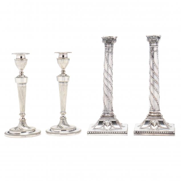two-pairs-of-silver-plated-candlesticks