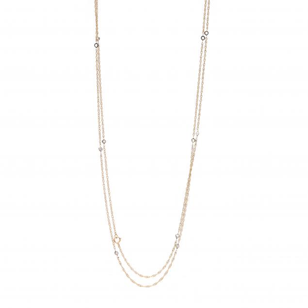 long-gold-and-diamond-station-necklace