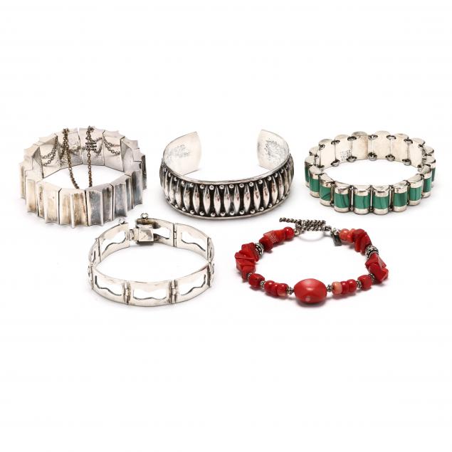 five-silver-bracelets