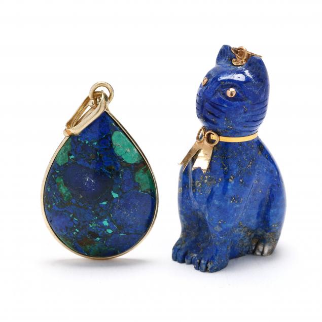 a-gold-and-lapis-cat-charm-pendant-and-a-gold-and-azurite-pendant