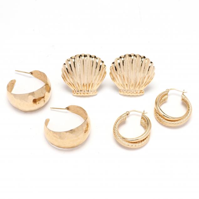 pairs-of-gold-hoop-earrings-and-a-pair-of-shell-motif-earrings