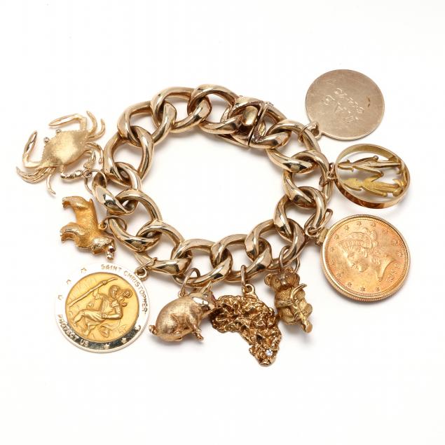 gold-charm-bracelet-by-tiffany-co-with-charms