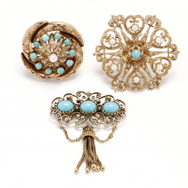 three-gold-and-turquoise-pendants-brooches