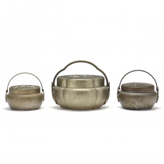 collection-of-three-chinese-brass-handwarmers