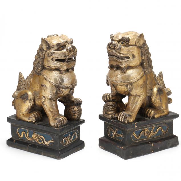 a-pair-of-chinese-carved-giltwood-foo-lions