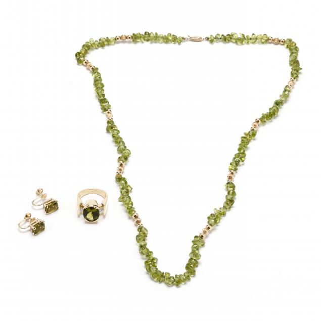 three-gold-and-peridot-jewelry-items