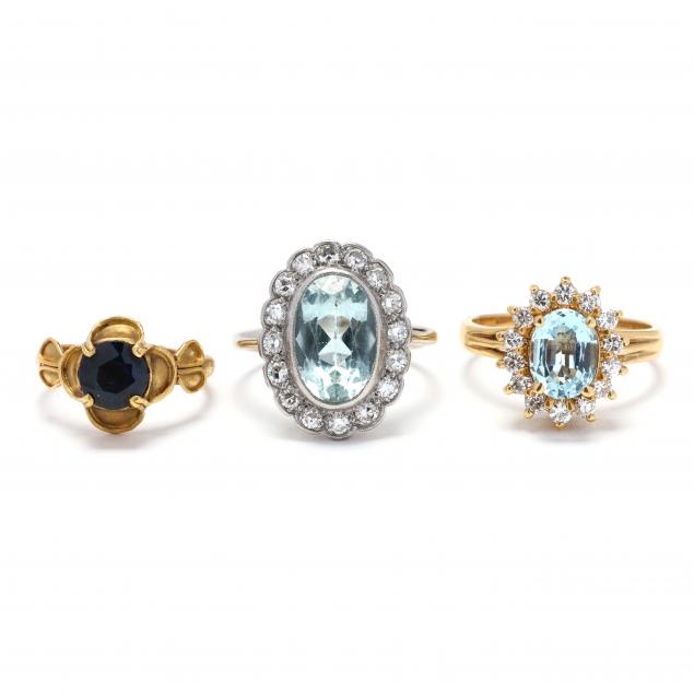 three-gold-and-gem-set-rings