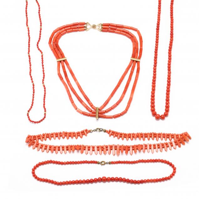 a-collection-of-coral-bead-necklaces