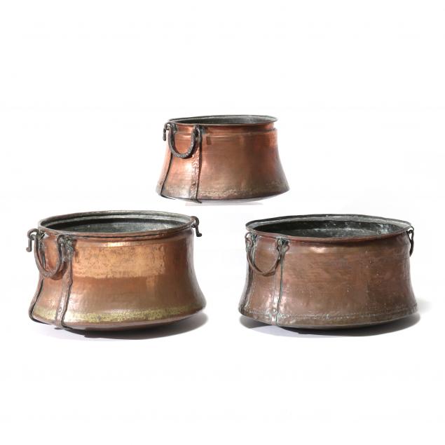 set-of-three-hammered-copper-cauldrons