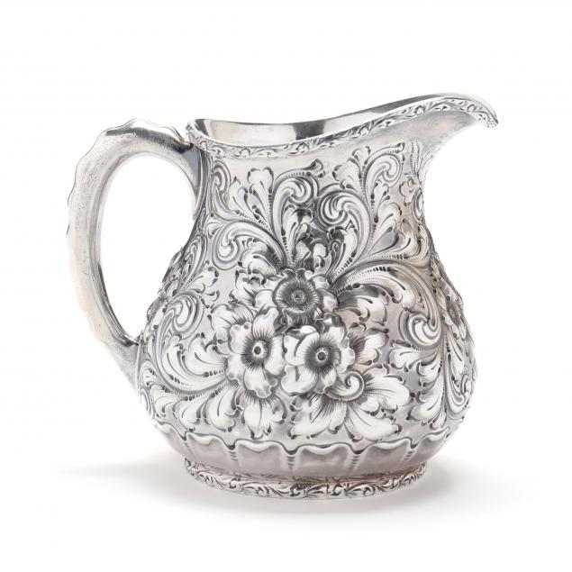 a-sterling-silver-repousse-creamer-by-dominick-haff