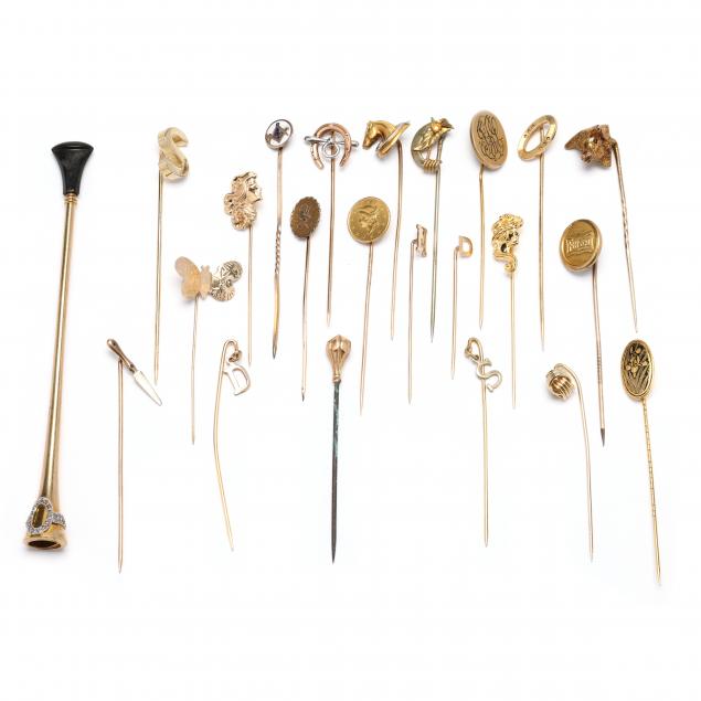 collection-of-twenty-two-vintage-gold-and-gold-filled-stick-pins-and-a-gold-cigarette-holder