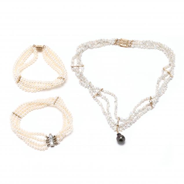 two-multi-strand-cultured-pearl-bracelets-and-a-freshwater-pearl-and-diamond-necklace