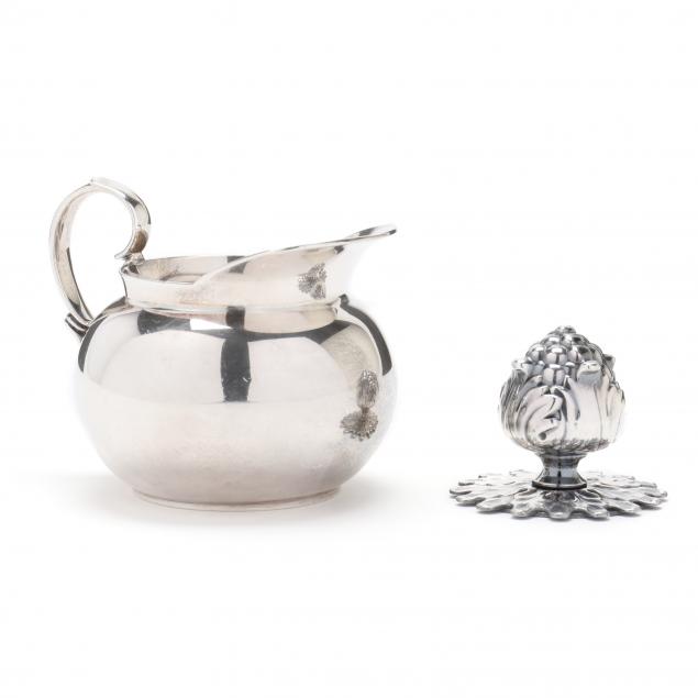 a-tiffany-co-sterling-silver-creamer-and-silver-plated-paperweight