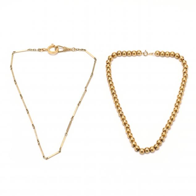 two-gold-necklaces