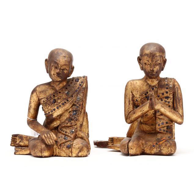 a-pair-of-burmese-gilt-and-lacquered-buddha-disciple-sculptures