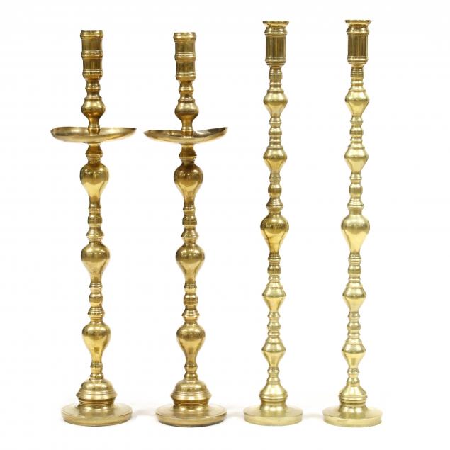 two-pairs-of-four-foot-tall-brass-candlesticks