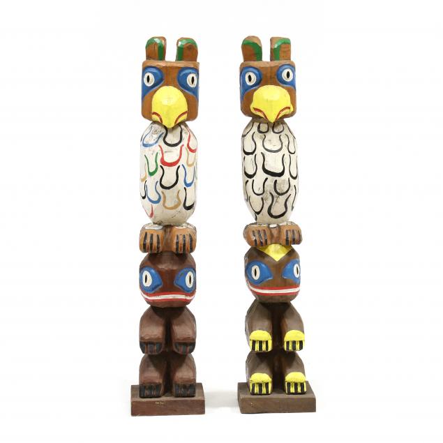 pair-of-pacific-northwestern-style-totem-poles