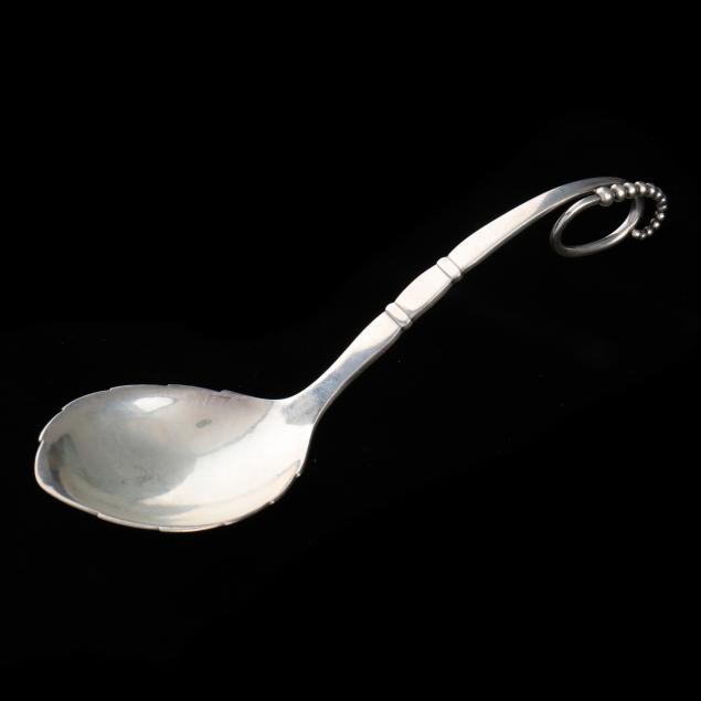 a-georg-jensen-sterling-silver-ornamental-serving-spoon
