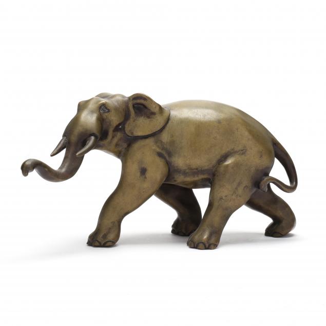 a-bronze-figural-sculpture-of-striding-pachyderm