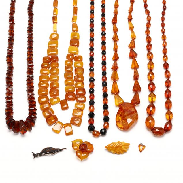 group-of-amber-jewelry-and-three-brooches