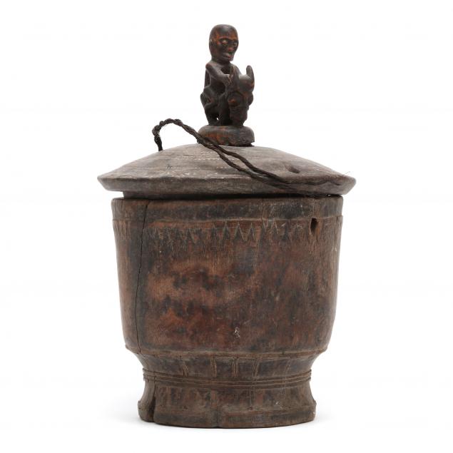 an-african-carved-wood-covered-jar-figural-motif