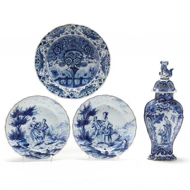 a-dutch-delft-blue-and-white-covered-vase-and-three-plates