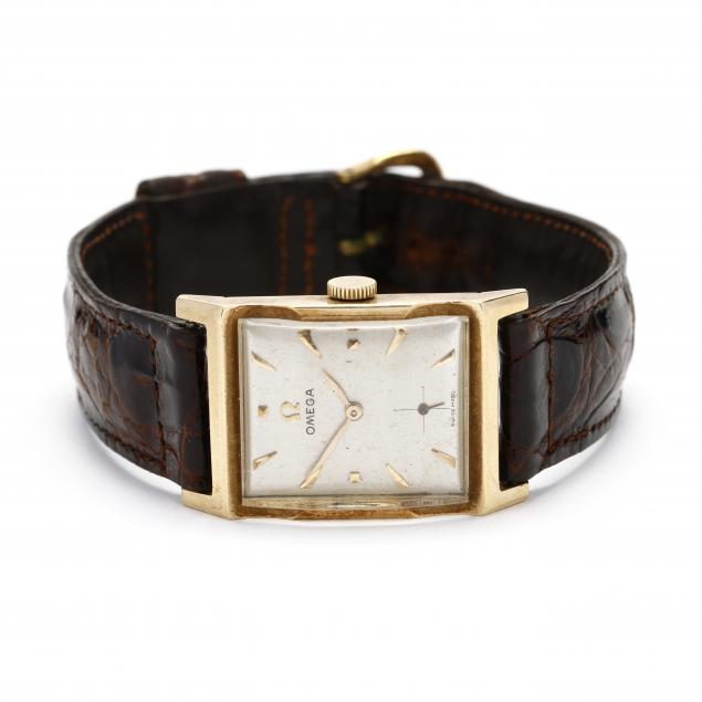 gold-vintage-wristwatch-omega