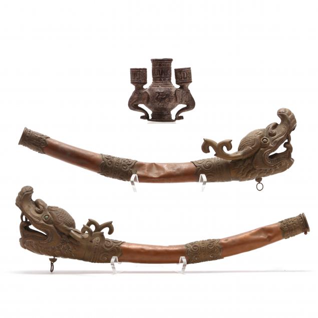 a-pair-of-tibetan-ceremonial-horns-and-indonesian-candle-holder