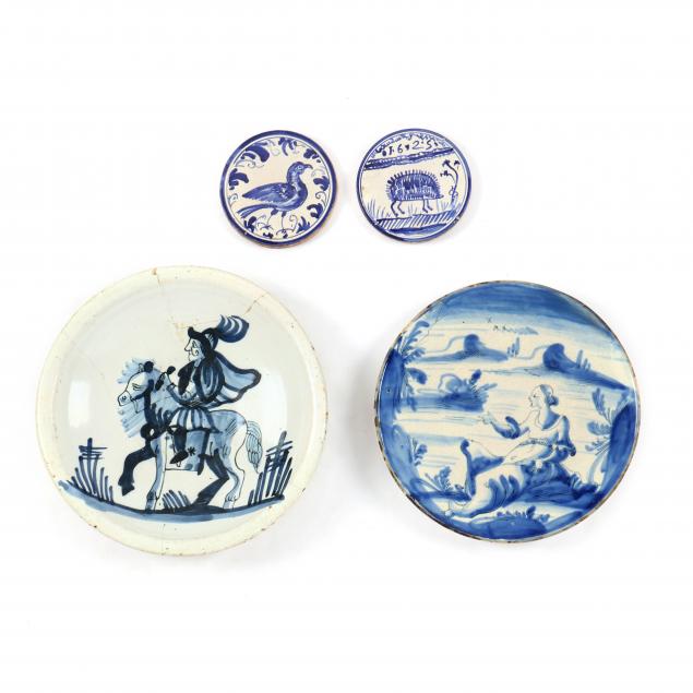 a-grouping-of-four-faience-and-delftware-tableware-items