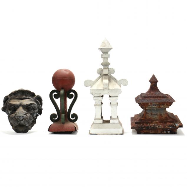 a-collection-of-four-tole-architectural-ornaments