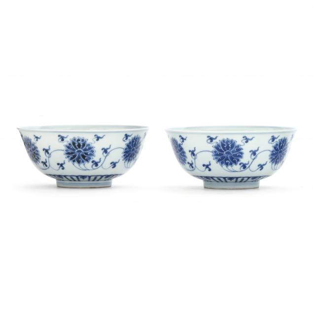 a-pair-of-chinese-porcelain-blue-and-white-lotus-bowls