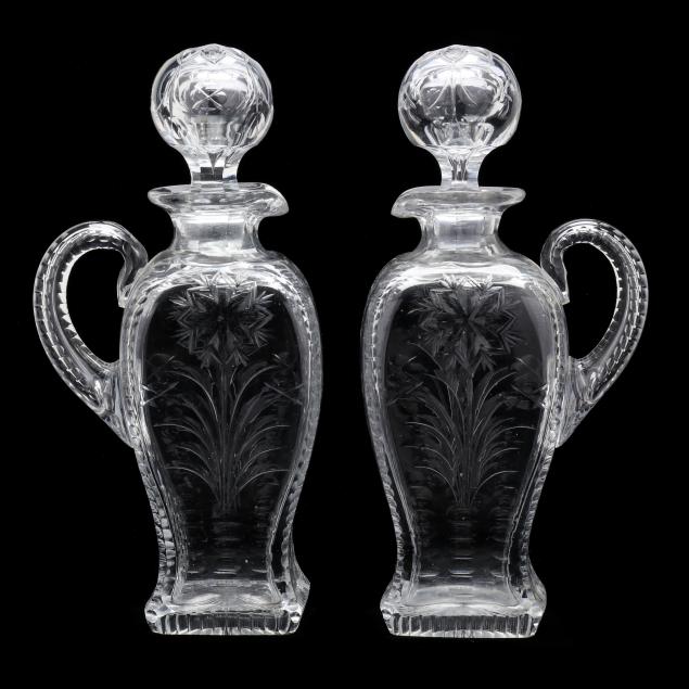 attributed-dorflinger-pair-of-rock-crystal-engraved-claret-jugs