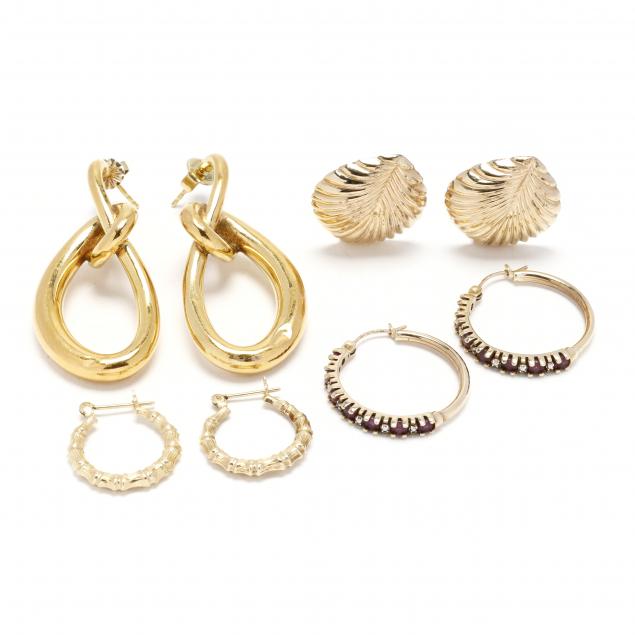 four-pairs-of-gold-earrings