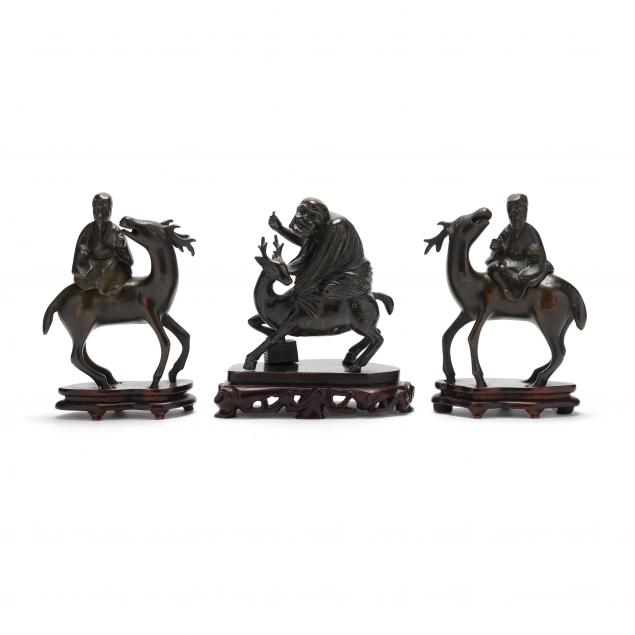 a-group-of-chinese-bronze-sculptures