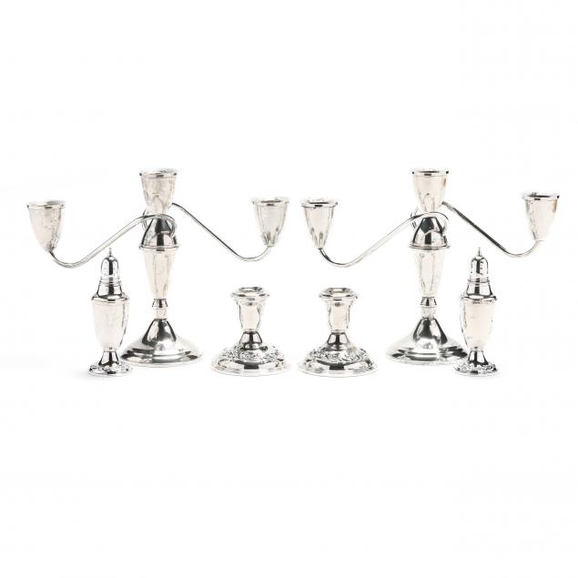 group-of-american-sterling-silver-candlesticks-and-salt-and-pepper-shakers