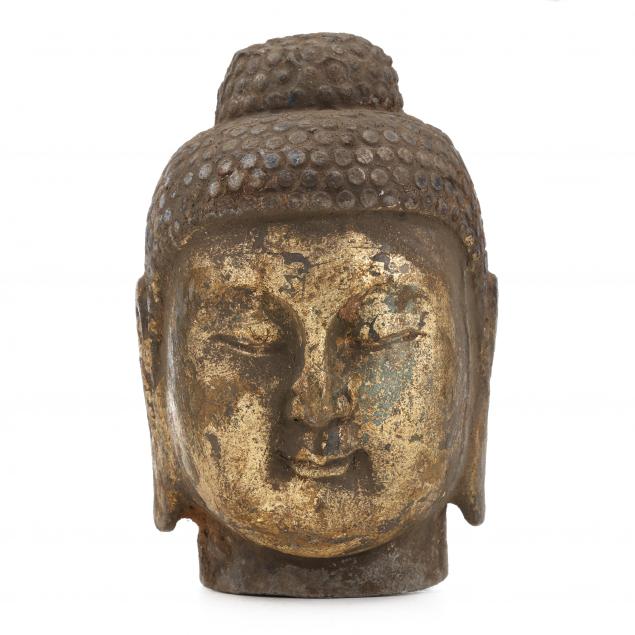 a-stone-buddha-head-with-gilt