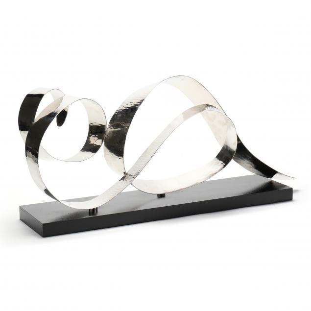 a-contemporary-abstract-hammered-aluminum-sculpture